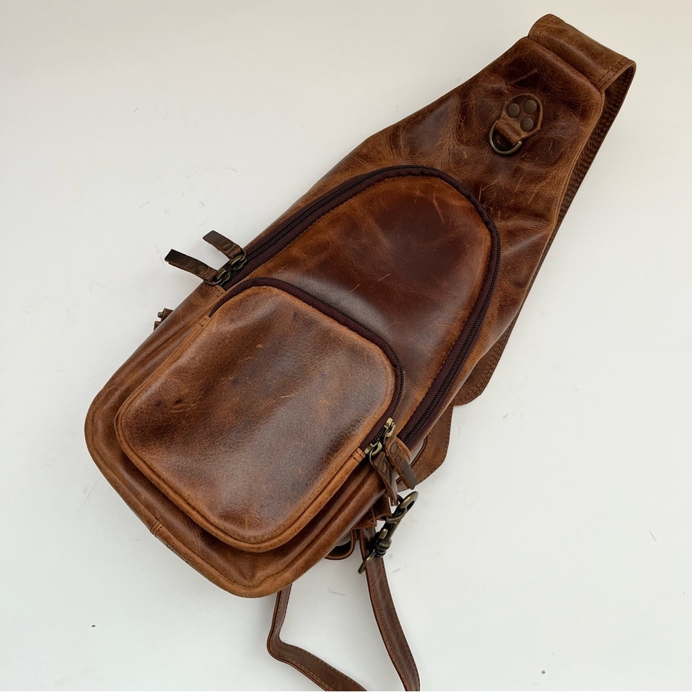 Wine Enthusiast Brown Leather Crossbody Bag For 1-2 bottles, depending height.